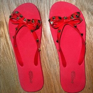 Red studded flip flop